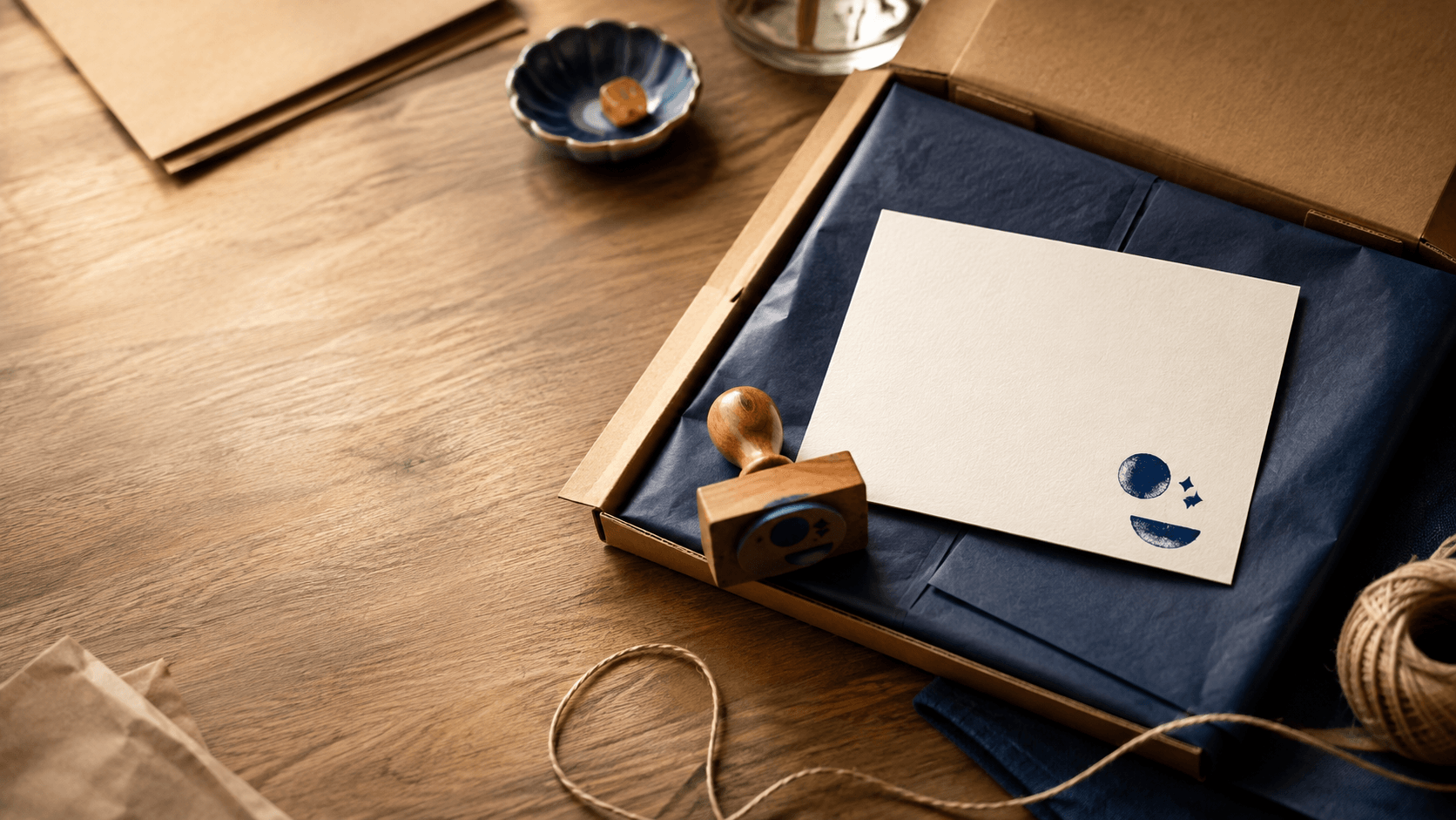 Thank-you stamp concept on cards and small-business packaging